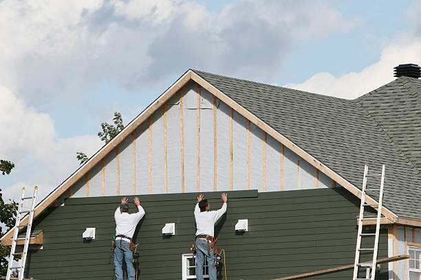 Professional Storm Damage Siding Repair technician working in Sproul, PA